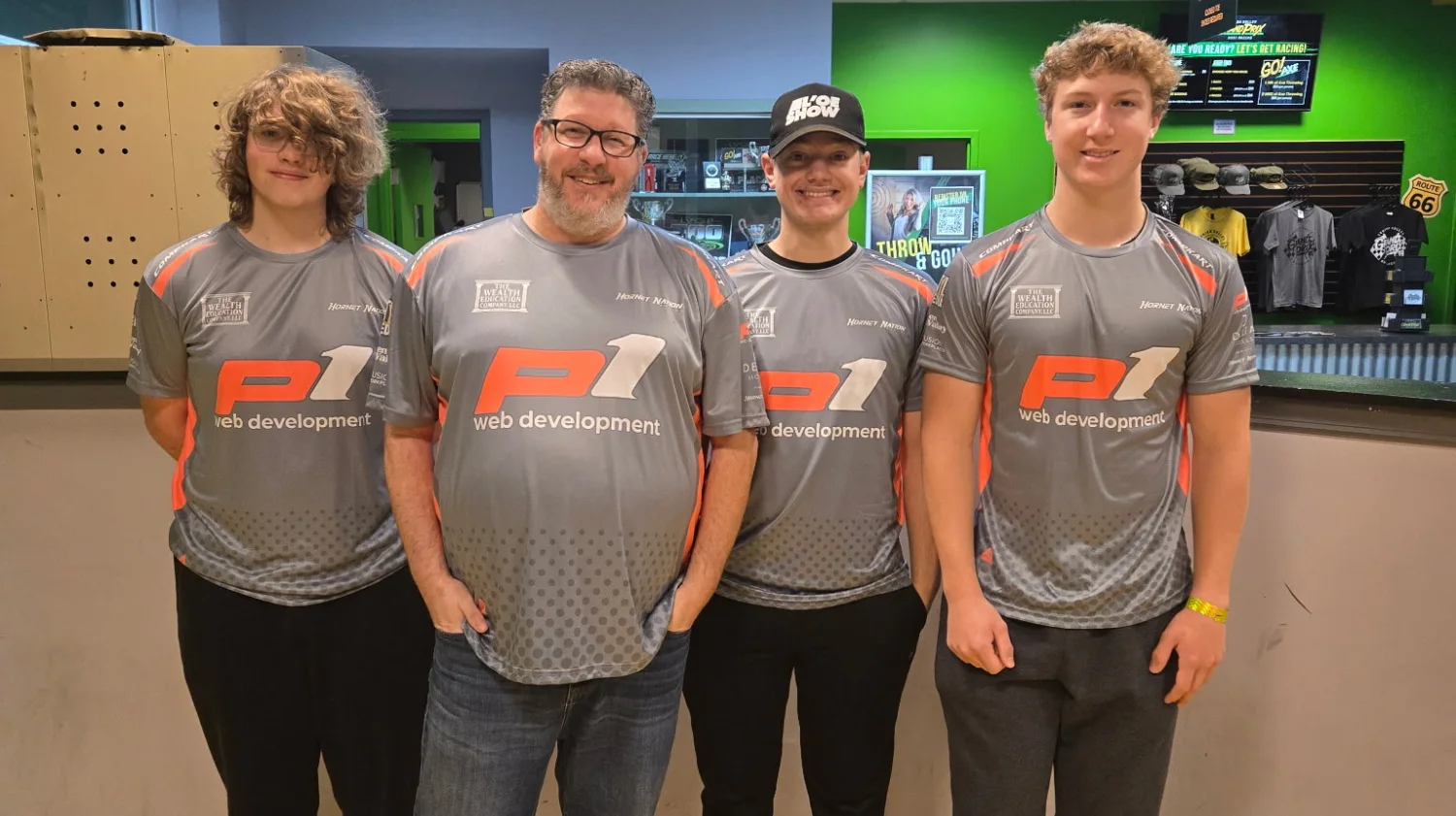 Hornet Nation Racing endurance team wearing P1 Web Development shirts at Lehigh Valley Grand Prix before the LVGP500