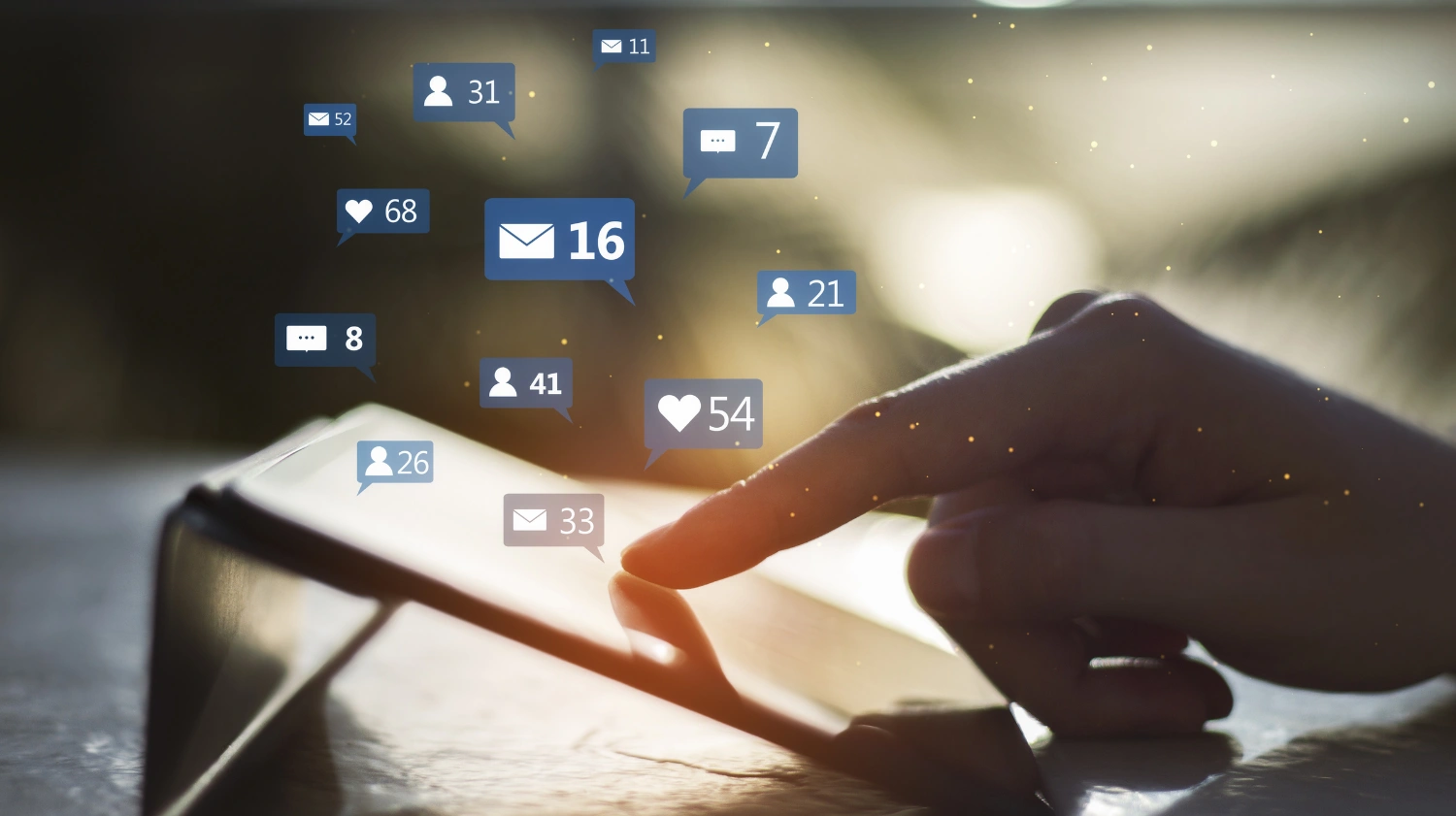 Person using a smartphone with social media notification icons floating above the screen